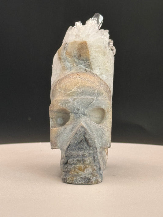 Hand Carved Skull with Quartz Crystals