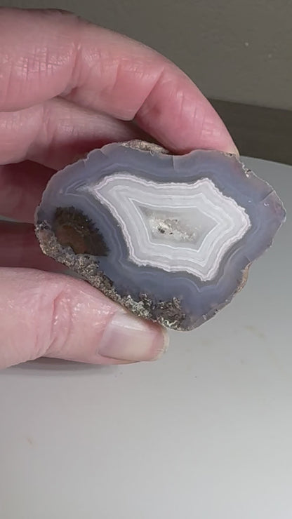 Face polished blue banded Brazilian Agate Geode